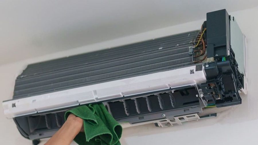 Ductless mini-split installed onto wall.