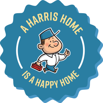 Blue scalloped badge with a smiling handyman carrying a toolbox and giving a thumbs up; motto reads 'A Harris Home is a Happy Home'.
