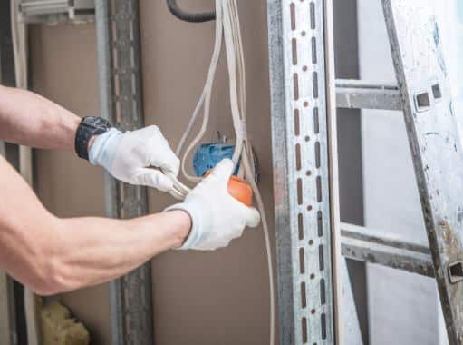 A electrician in New Jersey doing electrical repair and installation | New Jersey Electrical Services | Call Harris Now