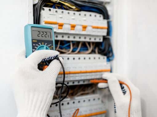 A electrician in Delaware doing electrical safety check | Delaware Electrical Services | Call Harris Now