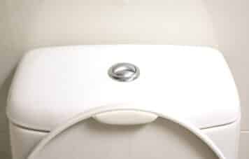 The metal button of toilet compose of normally and water saving botton