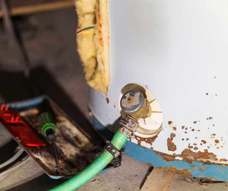 Flushing a water heater with a hose