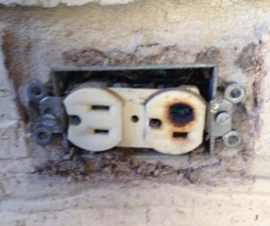burned damaged outlet