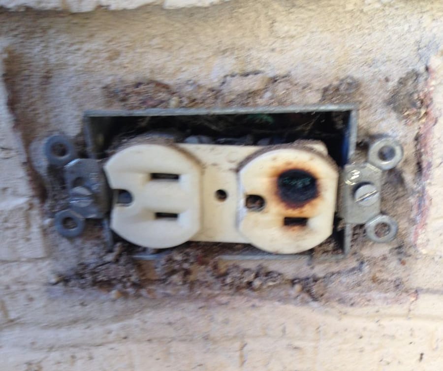 burned damaged outlet