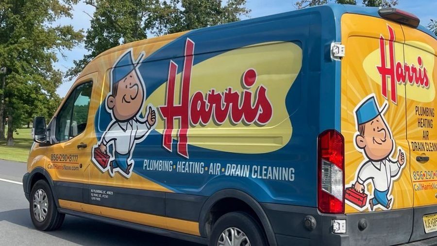Harris van on the road.